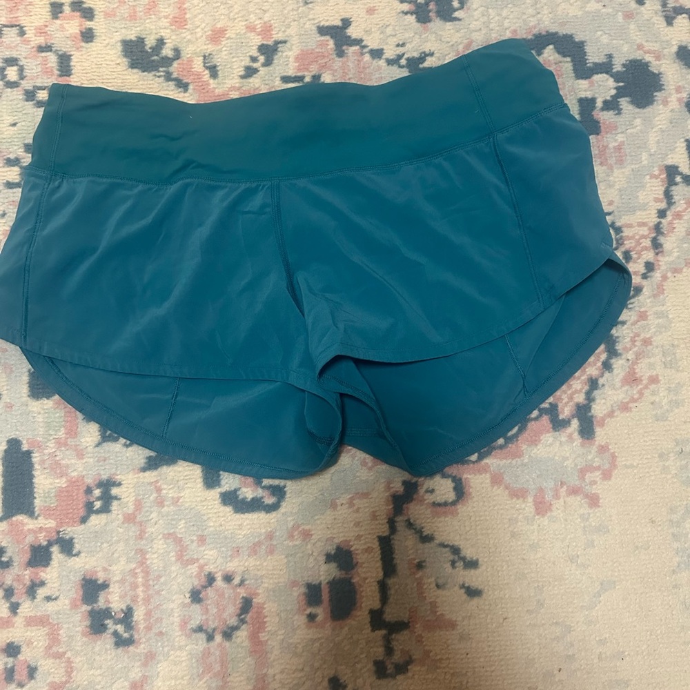 Lululemon Athletica Blue Athletic Shorts with Curved Hem